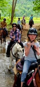 family horseback riding in belize